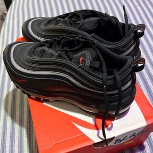 Cleaning out my closet. Love the sneakers fit me too small.